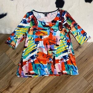Michael Tyler 3/4 sleeve top featuring a vibrant bold abstract art print